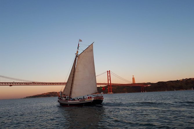 2-Hour Lisbon Traditional Boats Sunset Cruise with White Wine - Meeting near Commerce Square and finding your boat