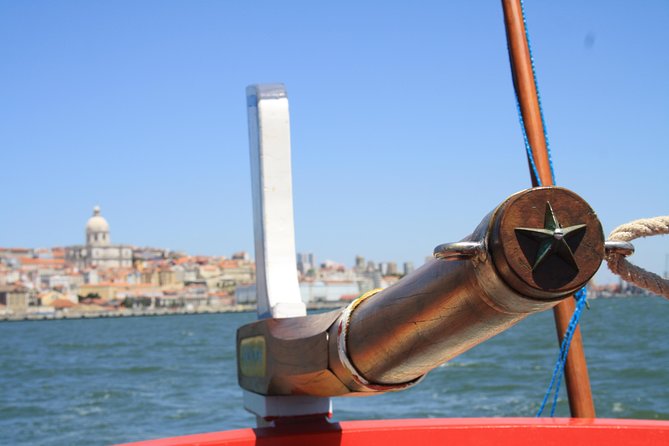 2-Hour Lisbon Traditional Boats Sunset Cruise with White Wine - A traditional Lisbon boat with a party-friendly mood