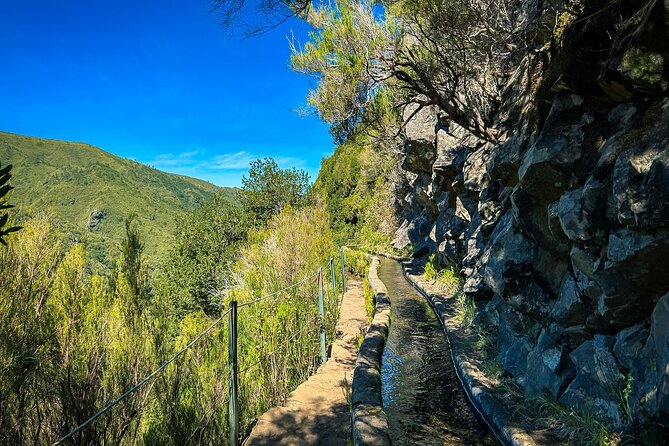 25 Fountains Levada: Hiking Tour in Madeira Rabaçal Valley (PR6) - Following the levada toward the waterfalls