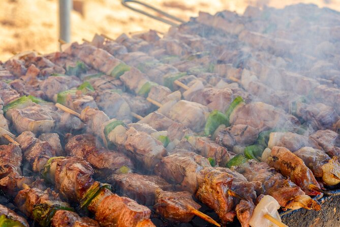 Albufeira Beach BBQ with Caves and Coastline Cruise with Open Bar - Three hours for paddleboards, swimming, and games