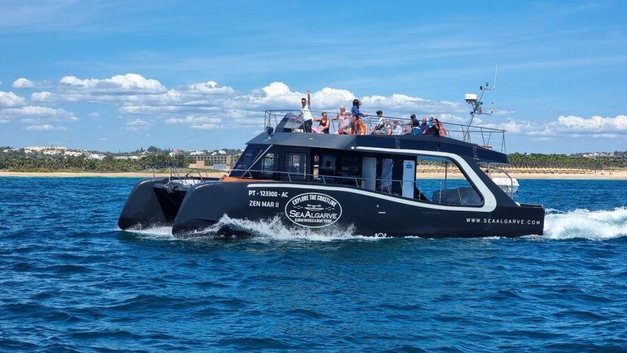 Albufeira: Coastline and Benagil Caves Tour by Catamaran - The Atlantic swim stop on the way back