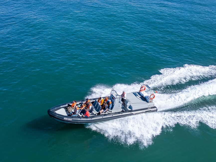 Albufeira: Dolphins, Benagil Caves and Coastline Boat Tour - Following the cliffs toward Benagil Cave