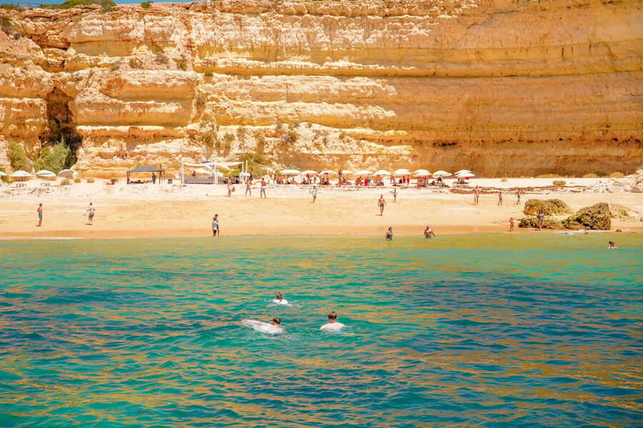 Albufeira: Sightseeing Cruise with Beach BBQ and Open Bar - Reaching The Secluded Beach By Dinghy