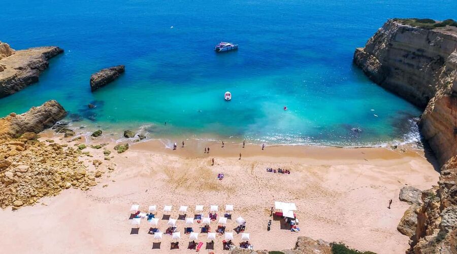 Albufeira: Sightseeing Cruise with Beach BBQ and Open Bar - Seeing Caves And Coastal Rock From The Water