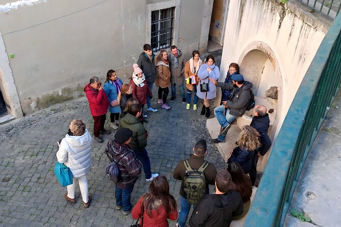 Alfama Tour in Lisbon Old Town - Starting beneath the blue umbrellas at Casa dos Bicos