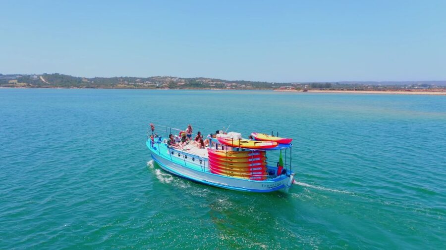 Alvor: Explore Caves Boat and Kayak Tour - Paddling into caves between Alvor and Praia do Vau