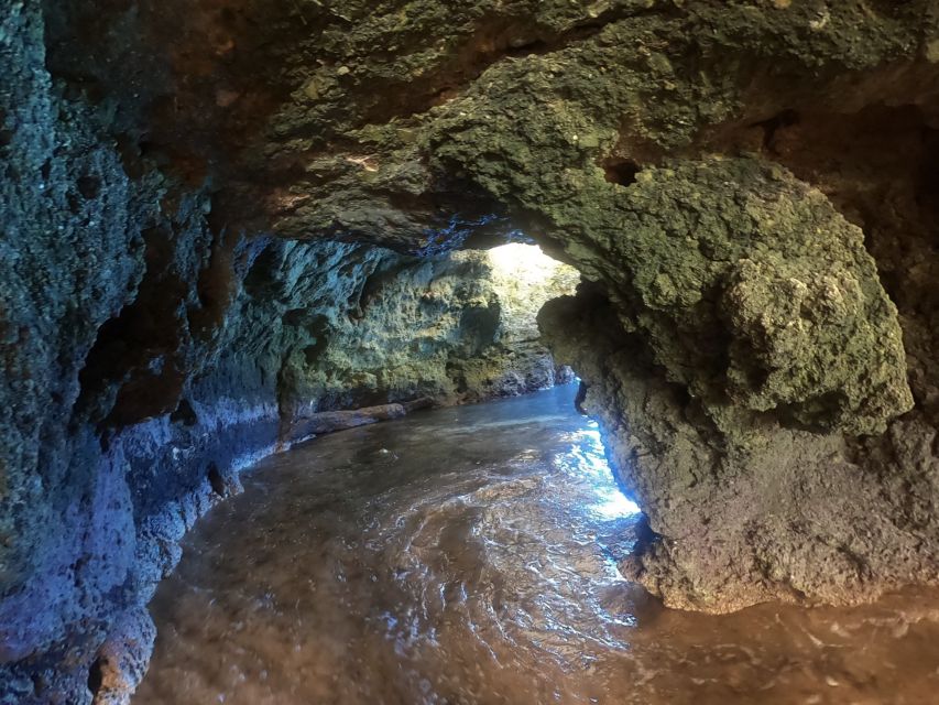 Alvor: Explore Caves Boat and Kayak Tour - A swim from the boat at the secret stop