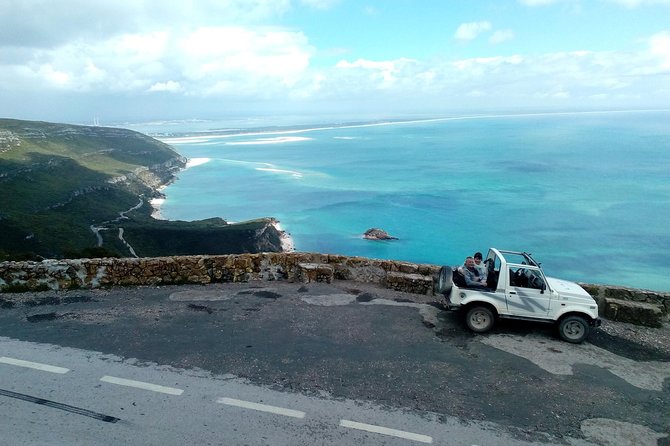 Arrabida Safari – Europe's Most Beautiful Beach & Hidden Gems - Sesimbra, fishing boats, and possible lunch