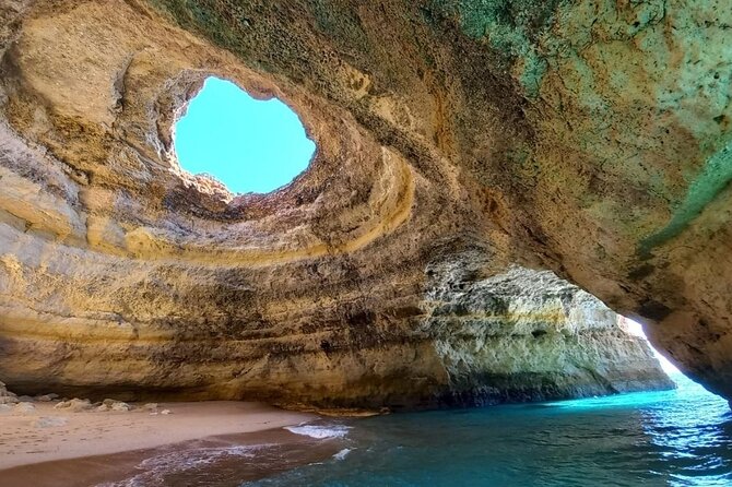 Boat tour Benagil Caves - Carvoeiro gives you a town from offshore
