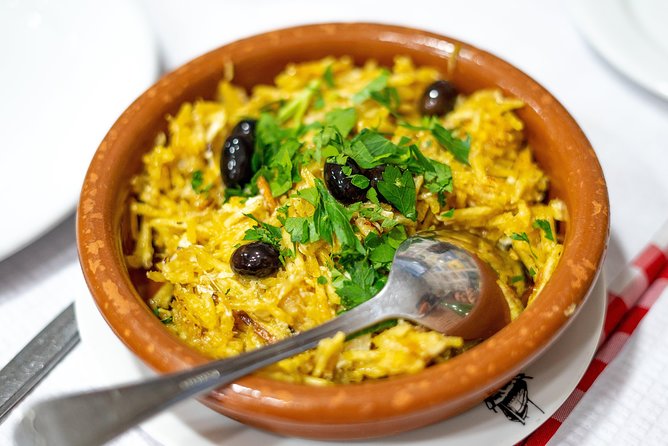 Devour Lisbon: The Ultimate Portuguese Food Tour - O Gaiteiro and a traditional tasca meal