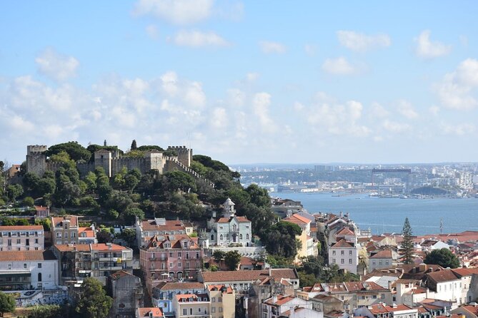 Expert Lisbon Tour with Local Guide in Private Eco Tuk Tuk - Alfama, Lisbon Cathedral, and the Portas do Sol view