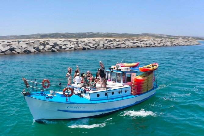 Explore Secret Caves and Beaches of Alvor - Boat & Kayak Tour - Cruising past Alvor Beach and Três Irmãos