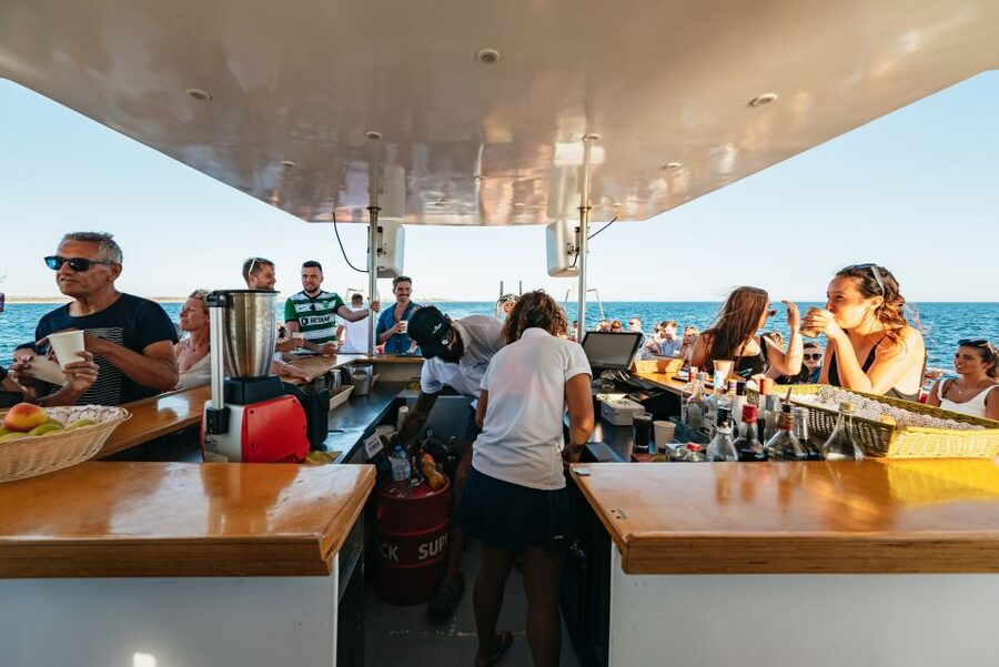 From Albufeira: Sunset Cruise and Beach BBQ with Open Bar - The open bar and the practical catch