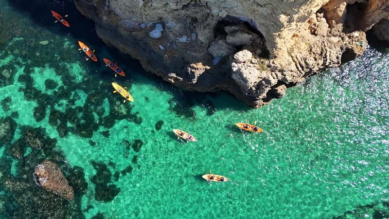 From Lagos: Ponta da Piedade Caves Kayak Tour from Catamaran - Starting at the shaded Lagos Marina meeting point