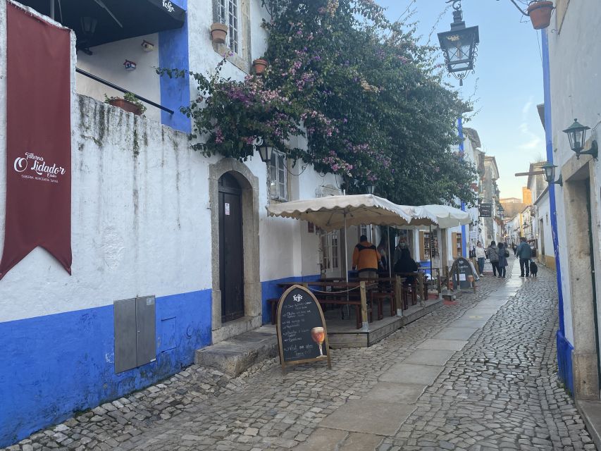 From Lisbon: Fátima, Batalha, Nazaré, and Obidos Tour by Van - Batalha Monastery and the 1385 victory