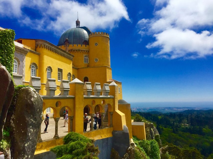From Lisbon: Pena Palace, Regaleira, Sintra & Cascais Tour - A scenic pass through Sintra before Cascais