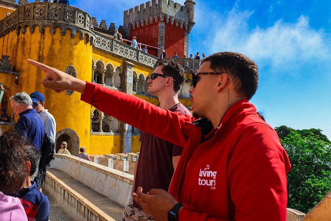 From Lisbon: Small Group to Pena Palace, Nazaré & Fátima - Pena Palace: colorful walls, gardens, and broad views