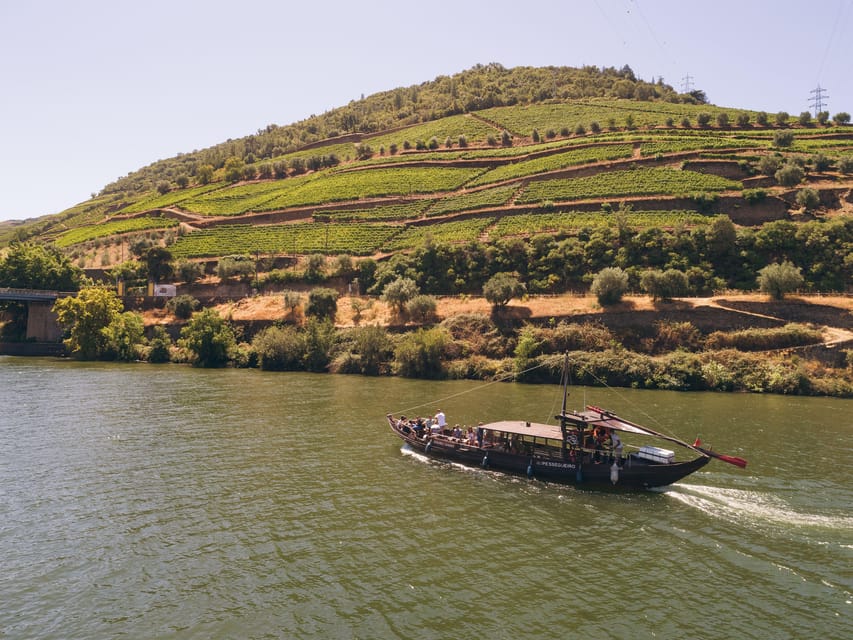 From Pinhão: Douro Valley Rabelo Boat Tour with Port Wine - What the Rabelo boat feels like onboard