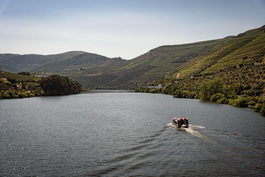 From Pinhão: Douro Valley Rabelo Boat Tour with Port Wine - From Pinhão station views to the Eiffel Bridge