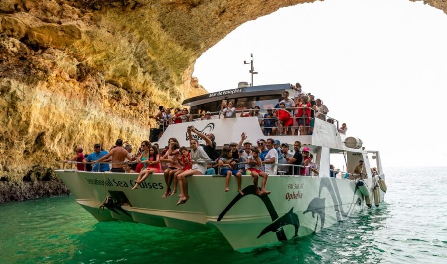 From Portimão: Catamaran Cruise to Benagil Caves with BBQ - Swimming and paddleboards around the cove