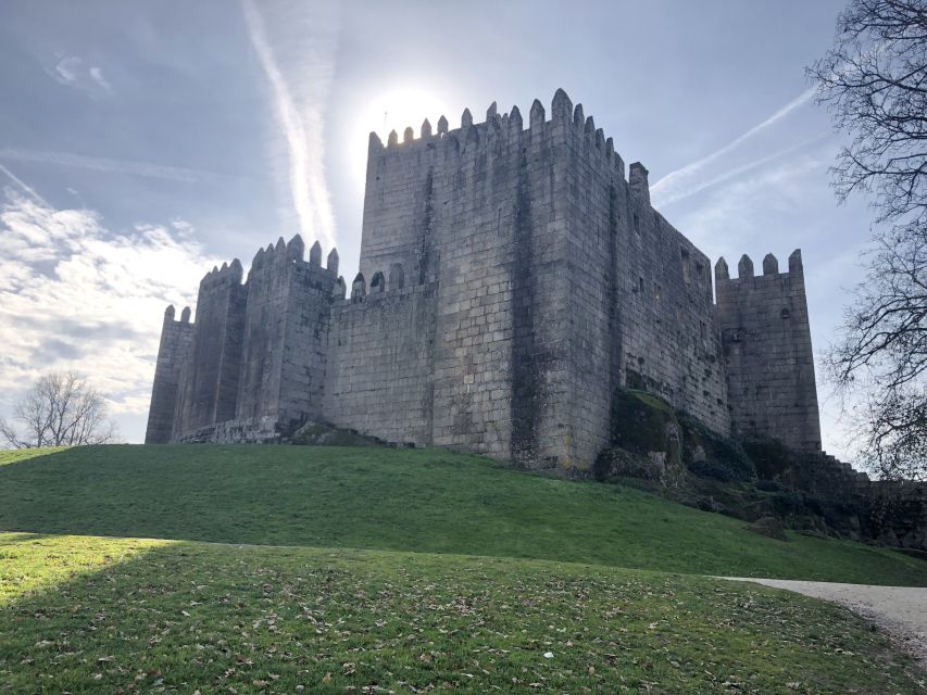 From Porto: Braga & Guimarães with Lunch Small Group Tour - A traditional Portuguese lunch with Vinho Verde