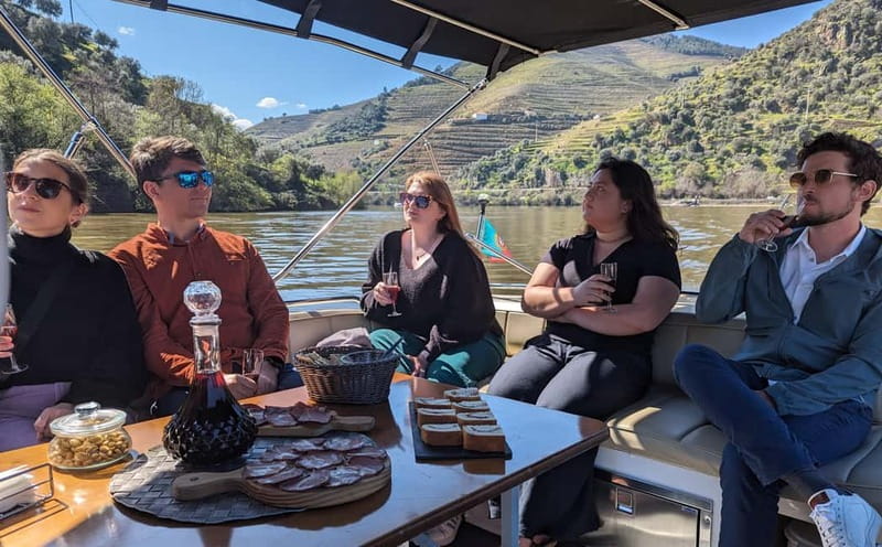 From Porto: Tastings at 2 Wineries, Chef's Lunch & Boat Tour - A private boat ride on the Douro