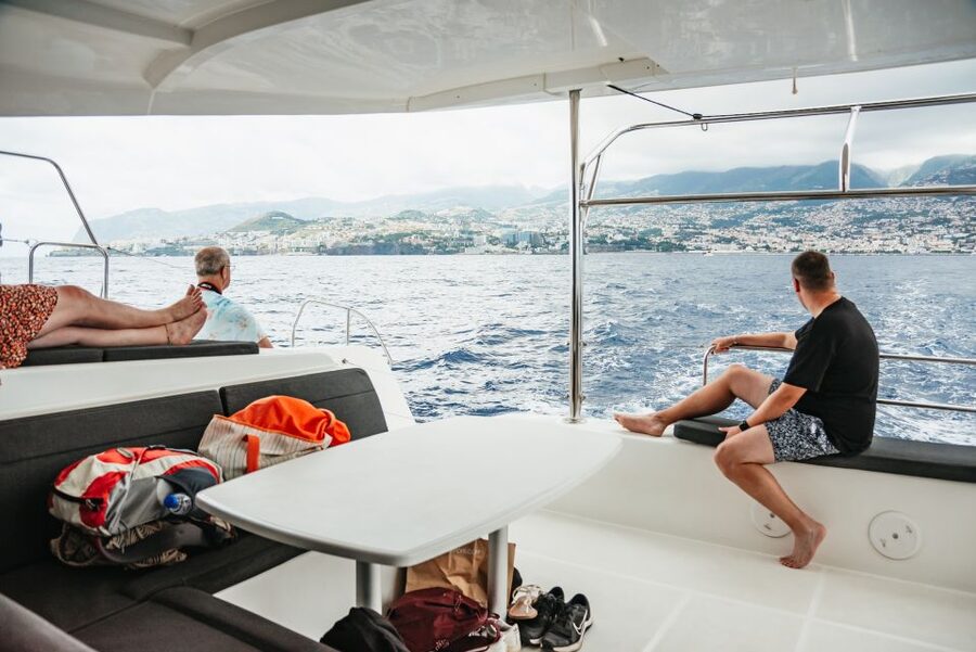 Funchal Bay: Dolphin & Whale Watch Luxury Catamaran Cruise - Swimming beneath Cabo Girão’s 580-meter cliffs