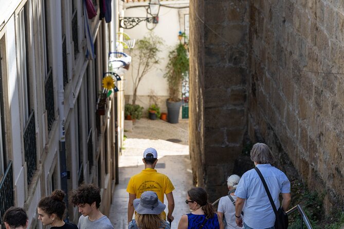 Historic Walking Tour Through Lisbon’s Oldest Neighborhood - Climbing toward Castelo de São Jorge