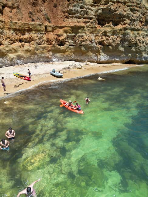 Lagoa: Benagil Caves and Wild Beaches Tour with Local Guide - A calm briefing before the paddling begins