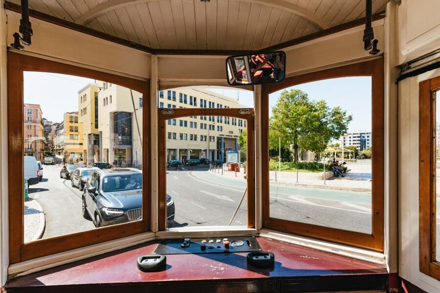 Lisbon: 72/96-Hour Hop-On Hop-Off Bus, Tram & Boat Ticket - The Yellow Boat beneath the 25th of April Bridge