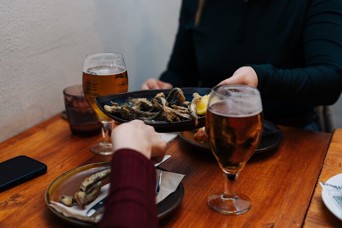 Lisbon: Award-Winning Guided Walking Food Tour with Local Drinks - Bifana and a cold beer on Rua da Madalena