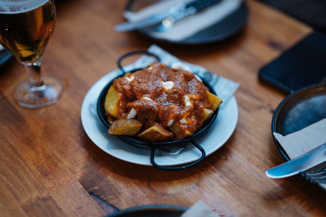 Lisbon: Award-Winning Guided Walking Food Tour with Local Drinks - Portuguese petiscos on Rua dos Fanqueiros