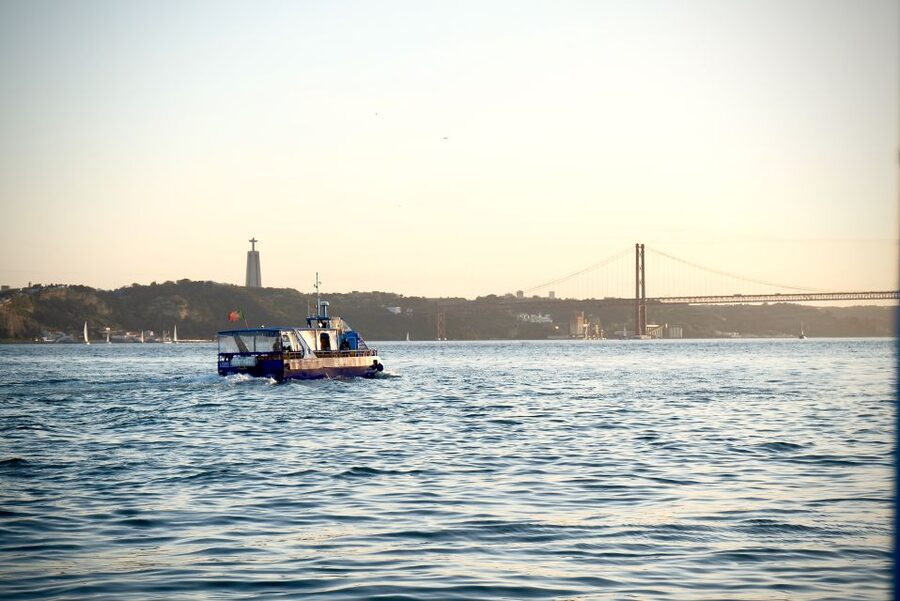 Lisbon: Boat Cruise with Live Fado Performance and a Drink - Passing Commerce Square and Lisbon’s central waterfront