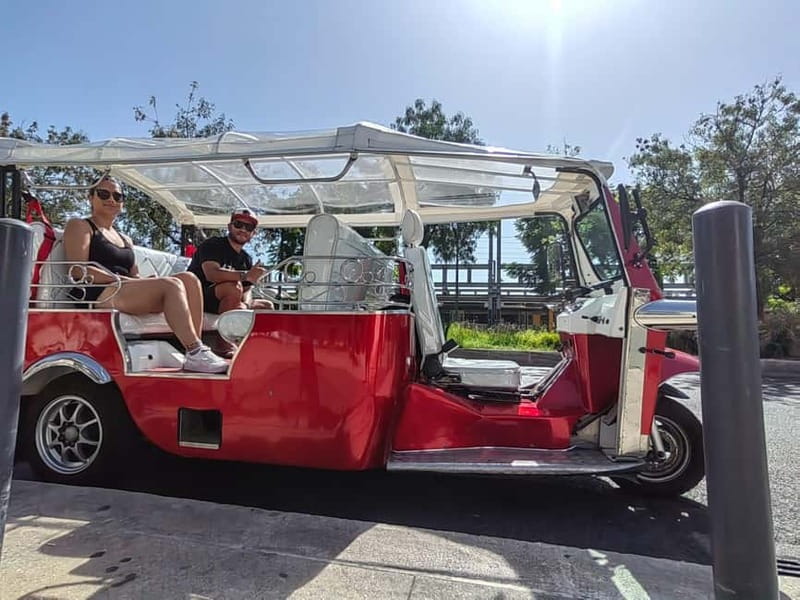 Lisbon: City Highlights Tuk-Tuk Tour with Pickup - Graça and Senhora do Monte above the rooftops