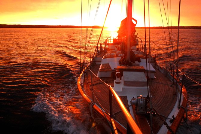 Lisbon: Daylight or Sunset on a Vintage Sailboat - Leaving the dock under the 25 de Abril Bridge