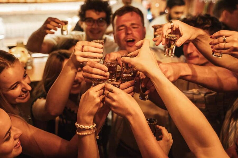 Lisbon: Drunken History Walking Tour with Included Drinks - Walking through Bairro Alto with a drink in hand