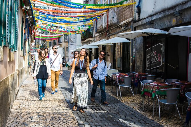 Lisbon Hidden Gems Walk: Traditions, Lunch and Ferry ride - Rossio, Chiado, and Lisbon’s patterned pavement