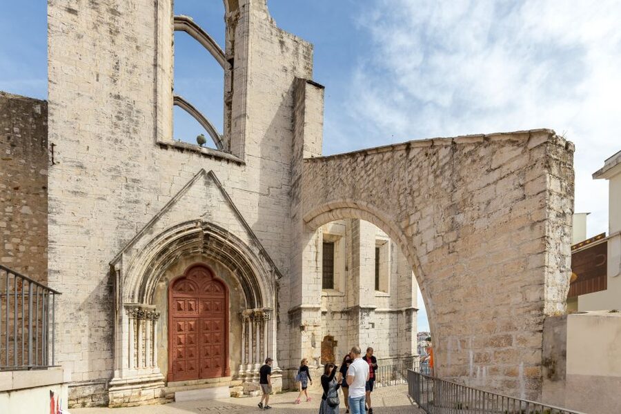 Lisbon: History, Stories and Lifestyle Walking Tour - Guides, group size, and the feel of the outing