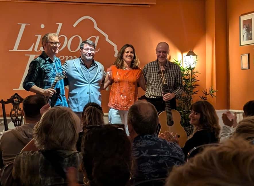 Lisbon: Live Fado Show with Port Wine in Historic Center - The Portuguese guitar deserves your attention