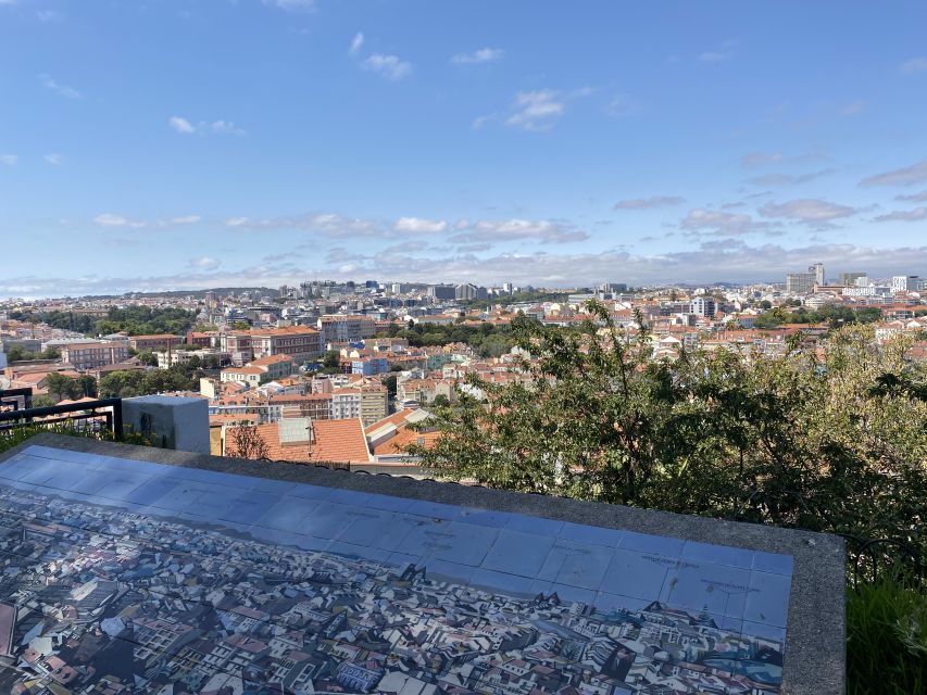 Lisbon: Private City Sightseeing Tour by Tuk-Tuk - Alfama by narrow lane and riverfront