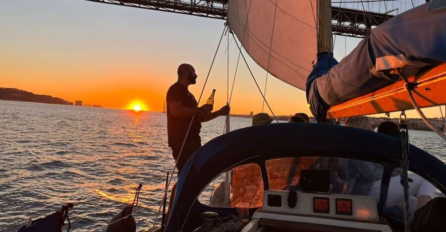 Lisbon: Sailboat Sunset Tour with a Drink - Commerce Square and the opening river view