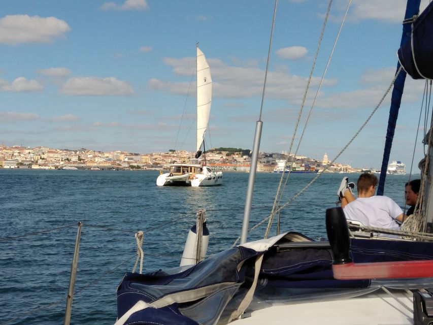 Lisbon: Sailing Tour with Wine and Snacks - Drinks, snacks, music, and the social mood