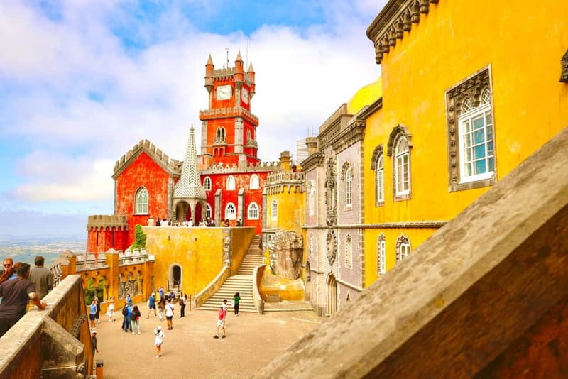 Lisbon: Sintra, Pena, Cascais & Cabo Day Tour with Tickets - Pena Palace: Portugal’s colorful mountain showpiece