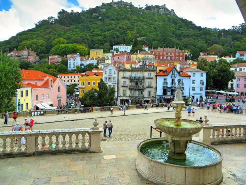 Lisbon: Sintra & Pena Palace Guided Tour with Hotel Pickup - Sintra’s old center and the National Palace