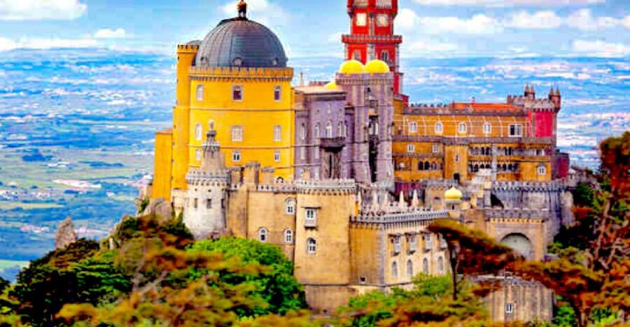 Lisbon: Sintra, Pena Palace, Quinta Regaleira, Cascais Tour - Sintra village, lunch, and the National Palace