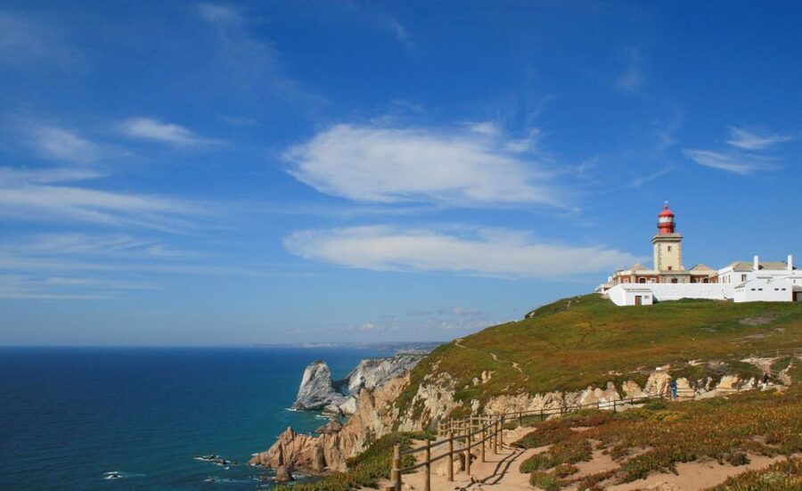 Lisbon: Sintra, Pena Palace, Quinta Regaleira, Cascais Tour - Leaving Lisbon and passing Queluz