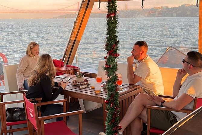 Lisbon: Sunset Catamaran Boat Tour with Music and Drinks - Modern Lisbon along the western waterfront