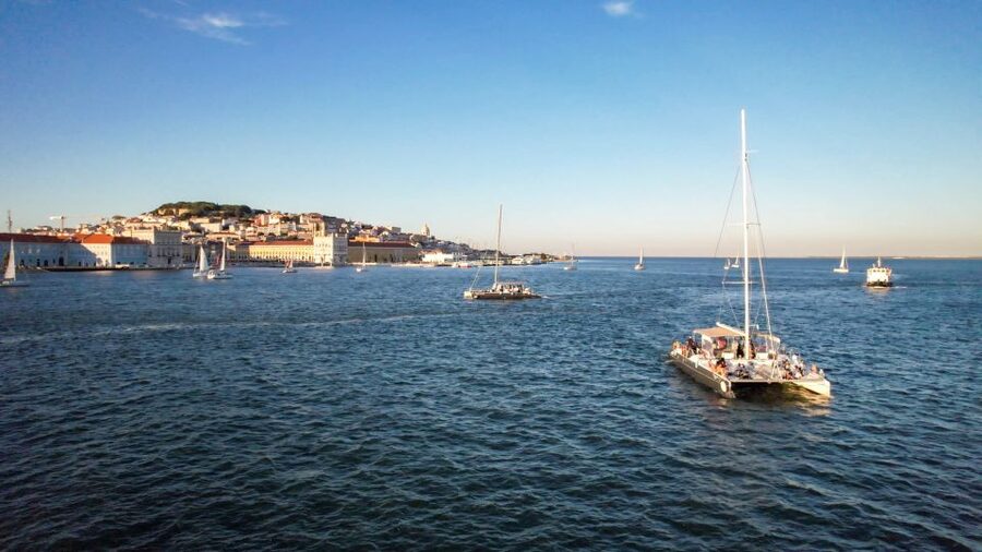 Lisbon: Sunset Catamaran Boat Tour with Music and Drinks - What the $26 price really buys you