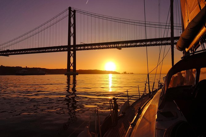 Lisbon Sunset Sailing Tour on Luxury Sailing Yacht with 2 Drinks - Wine, cheese, and the changing light