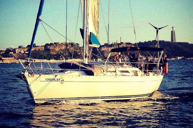 Lisbon Sunset Sailing Tour with White or Rosé Wine and Snacks - Under the 25th of April Bridge